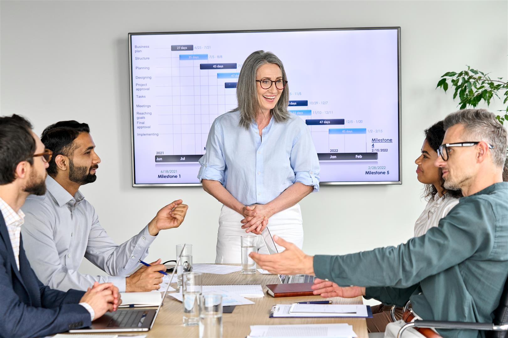 happy diverse corporate team having presentation i 2025 02 11 16 22 32 utc