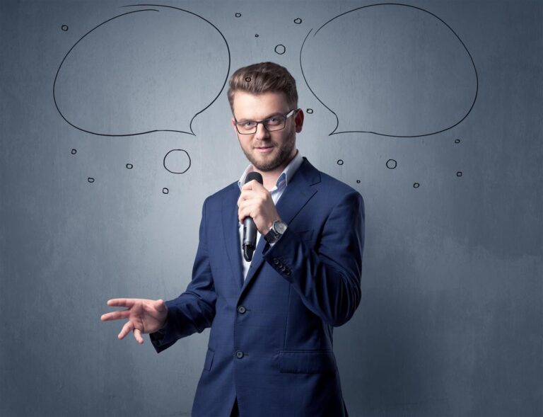 businessman speaking into microphone with speech b 2025 10 13 12 18 13 utc