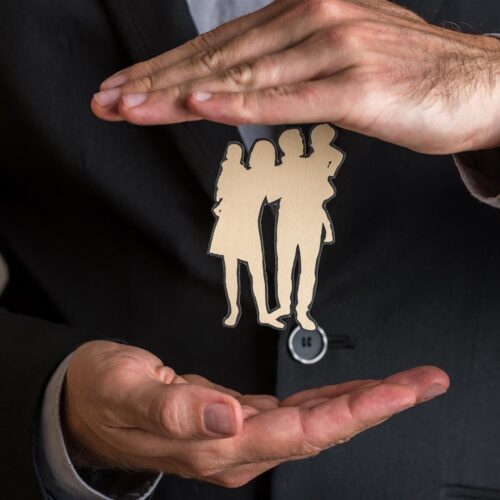 insurance agent making protecting gesture around a 2025 02 18 12 59 21 utc